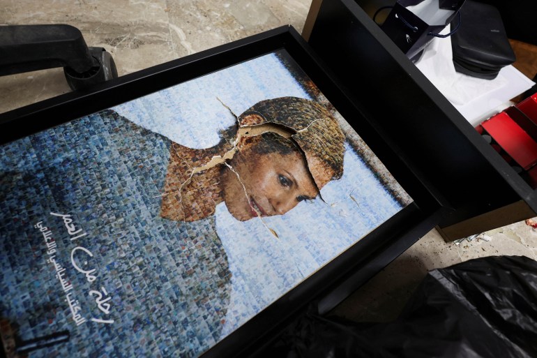 A view of a picture of Asma, wife of Syria's Bashar al-Assad at one of the rooms in Presidential Palace known as Qasr al-Shaab "People's Palace", after rebels seized the capital and ousted Syria's Bashar al-Assad, in Damascus, Syria December 10, 2024. REUTERS/Amr Abdallah Dalsh