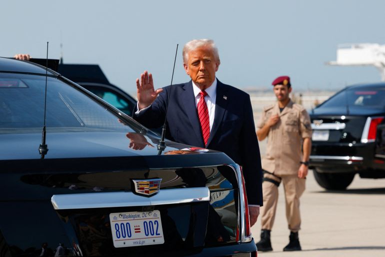 U.S. President Donald Trump gestures upon his arrival at Hamad International Airport, in Doha, Qatar, May 14, 2025. REUTERS/Brian Snyder