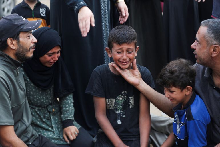 Mourners react during the funeral of Palestinians killed by Israeli fire while trying to receive aid on Saturday, and others killed in overnight strikes, according to medics, at Al-Shifa Hospital in Gaza City, September 7, 2025. REUTERS/Mahmoud Issa