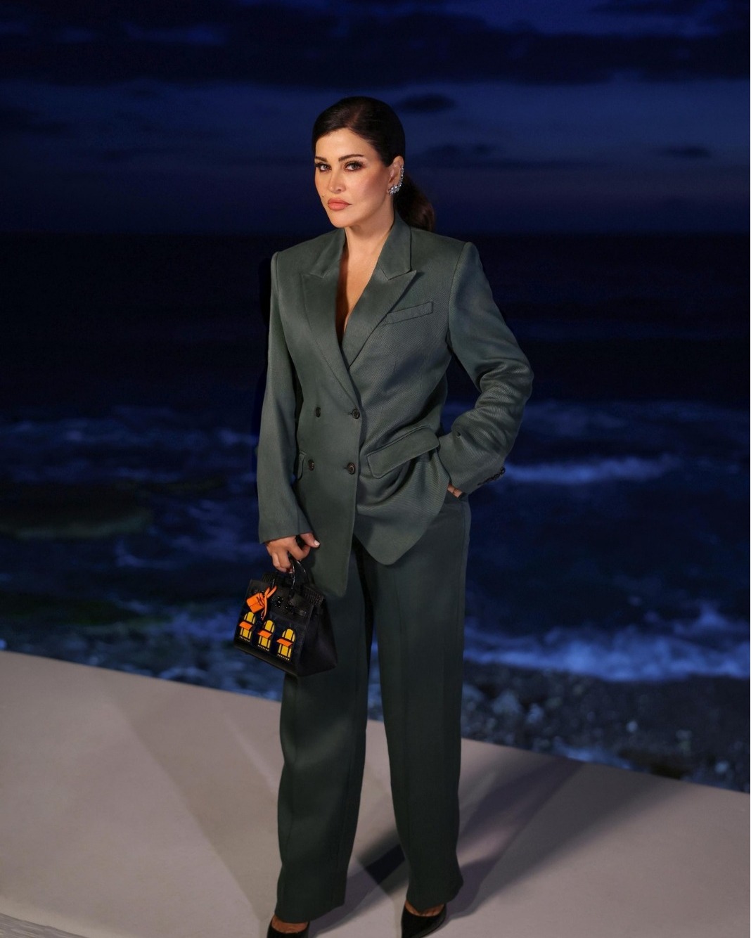 May be an image of 1 person and suit