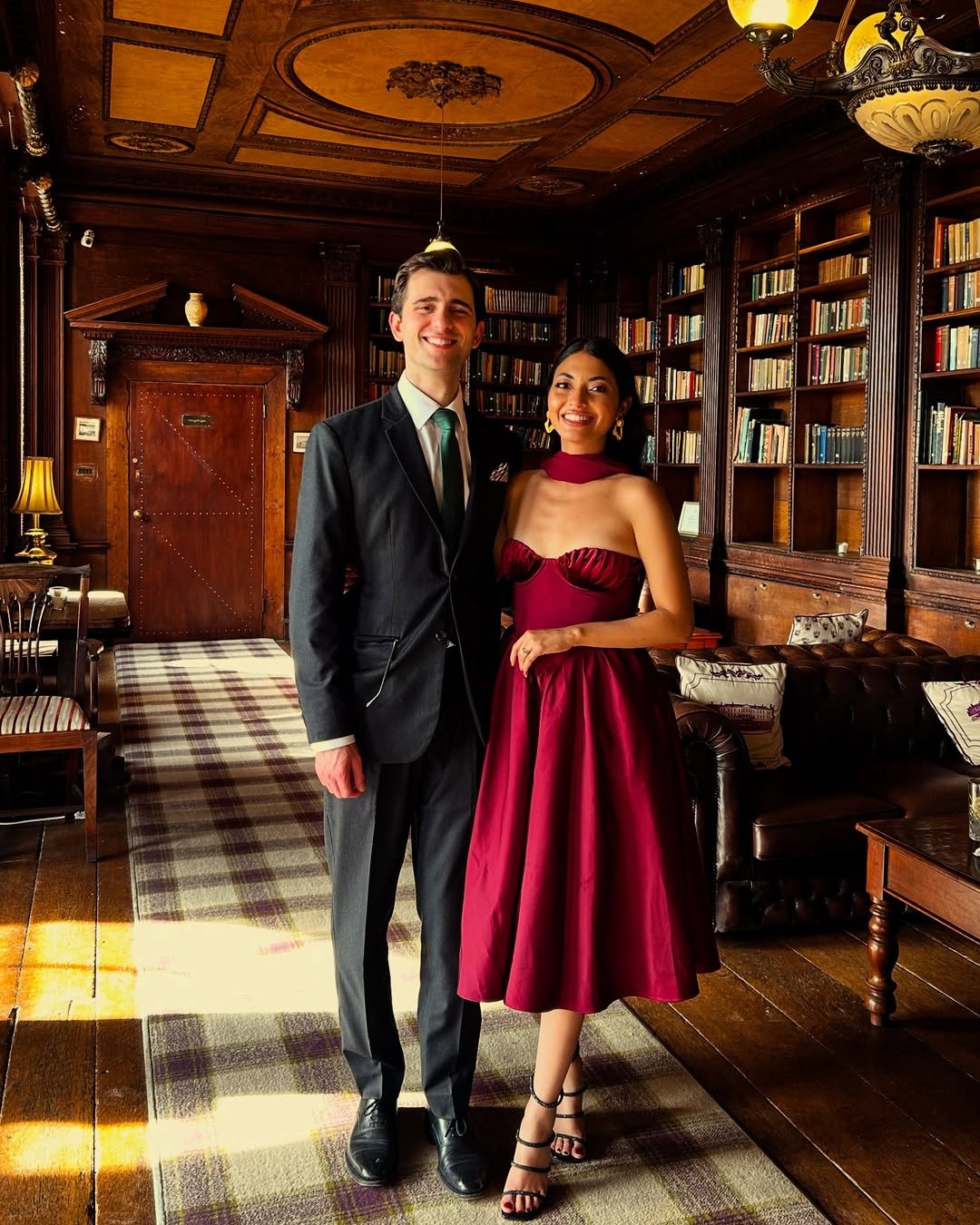 May be an image of 2 people and suit